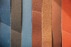 different abrasive papers lined up